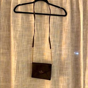 Black Kate Spade mini cross body with gold chain